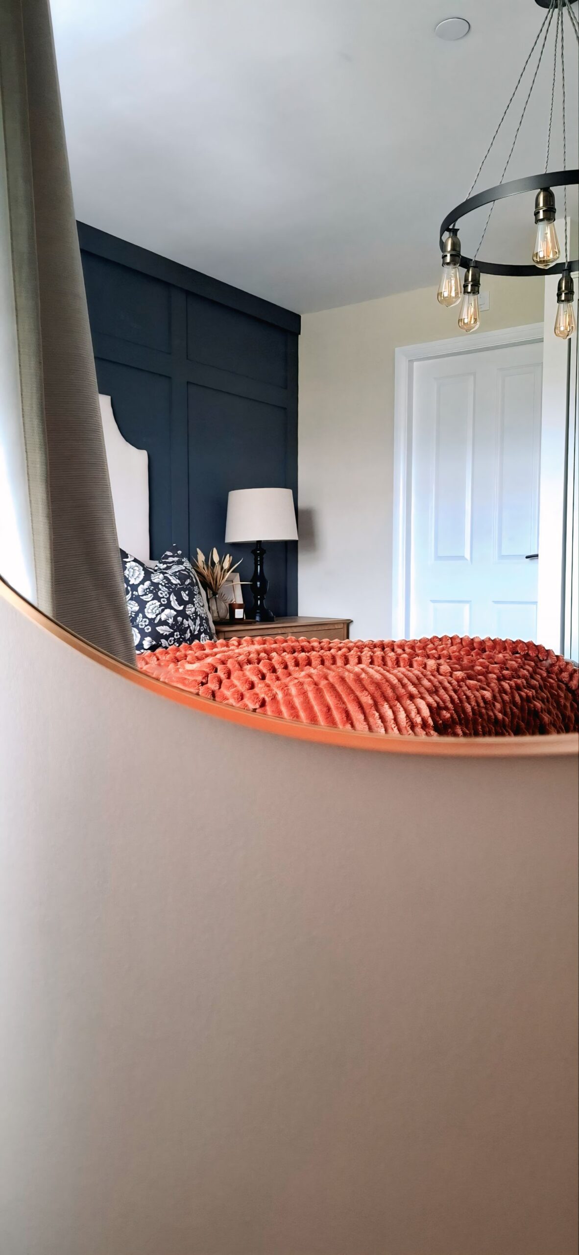 Through the mirror view of master bedroom